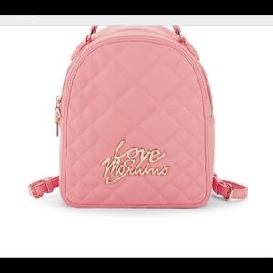 Light pink Moschino back pack.